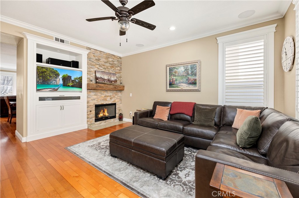 40152 Stowe Road Temecula, CA 92591 - Photo 21 of 56 a living room with furniture and a fireplace