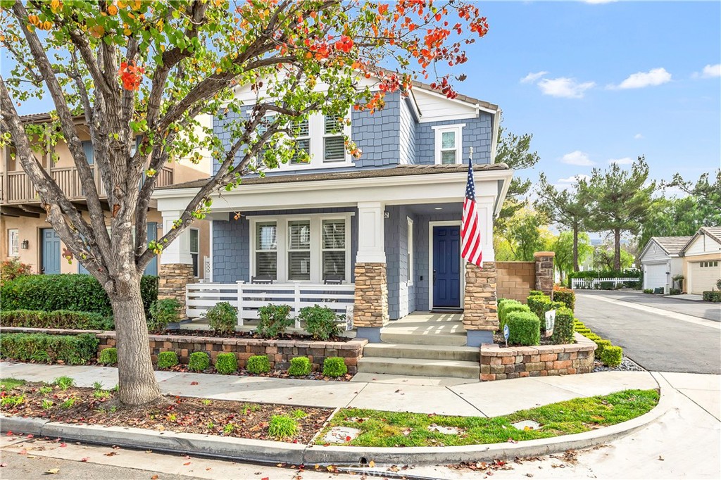 40152 Stowe Road Temecula, CA 92591 - Photo 46 of 56 front view of a house with a small yard