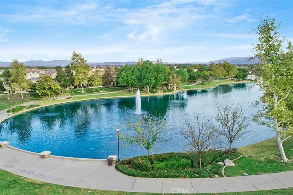 40152 Stowe Road Temecula, CA 92591 - Photo 49 of 56 a view of a lake with houses in the back