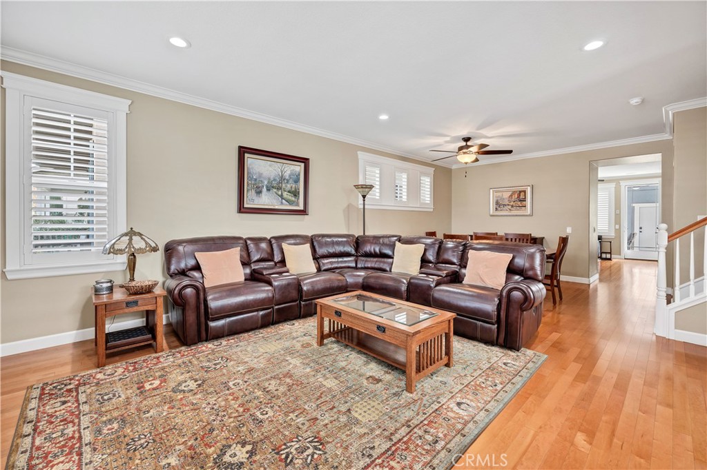 40152 Stowe Road Temecula, CA 92591 - Photo 5 of 56 a living room with furniture and wooden floor