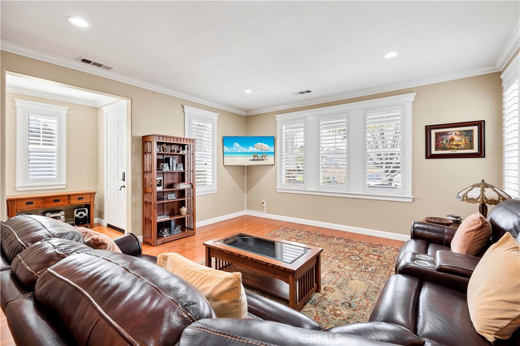 40152 Stowe Road Temecula, CA 92591 - Photo 6 of 56 a living room with furniture and a window