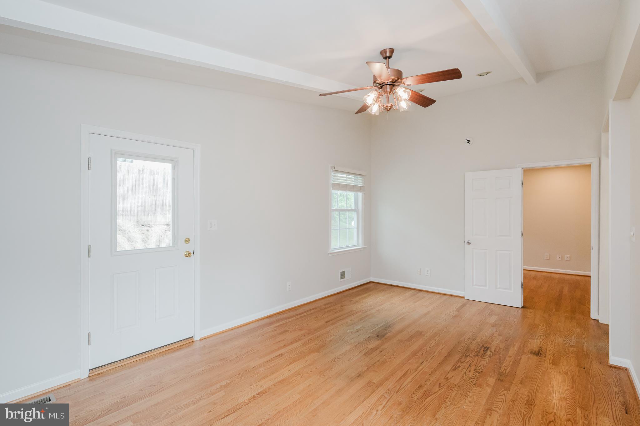 4 Old Spring Court Cockeysville, MD 21030 - Photo 21 of 53 a view of empty room with wooden floor
