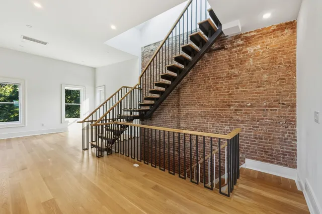 a view of entryway with wooden floor