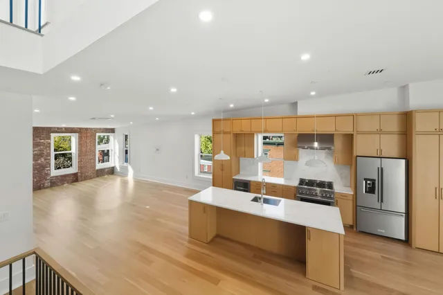 a lobby with furniture and outdoor space