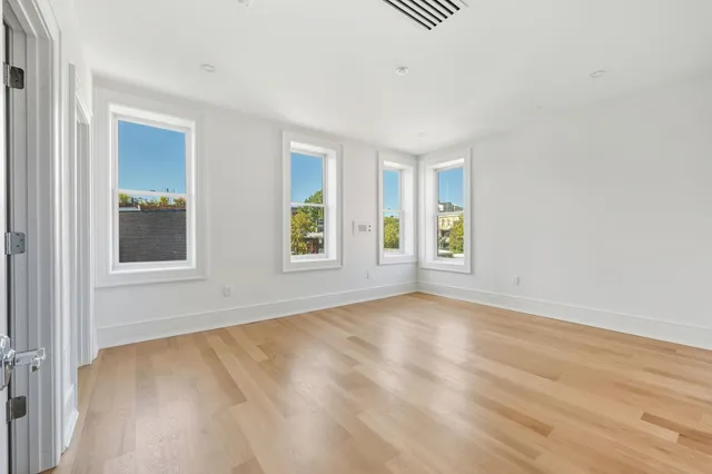 an empty room with windows