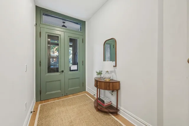 a room with a table and chairs