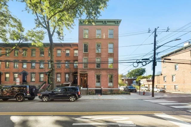 a view of a building and a street