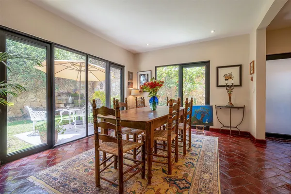 a view of a dining room kitchen counter and chairs