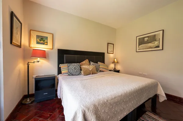 a bedroom with a bed and closet