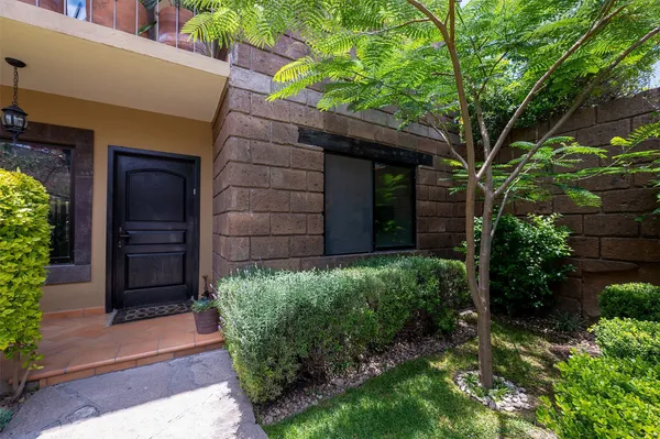a view of a back yard of the house
