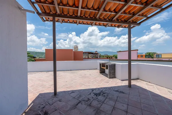 a view of a swimming pool with a porch