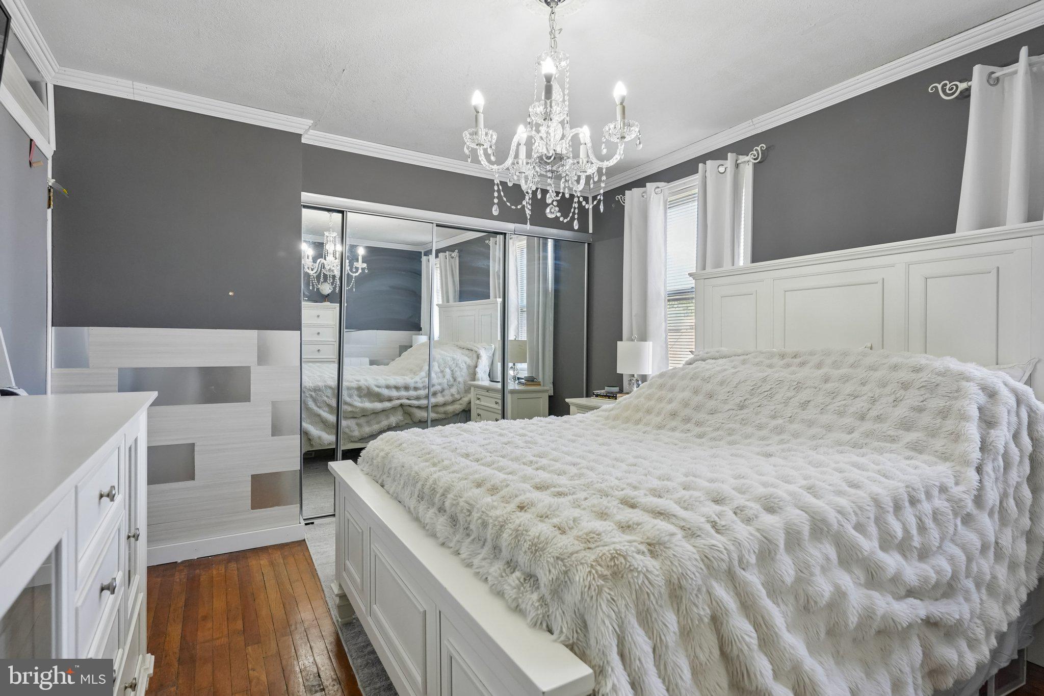 7242 Algard Street Philadelphia, PA 19135 - Photo 14 of 25 Elegant bedroom with chic decor.