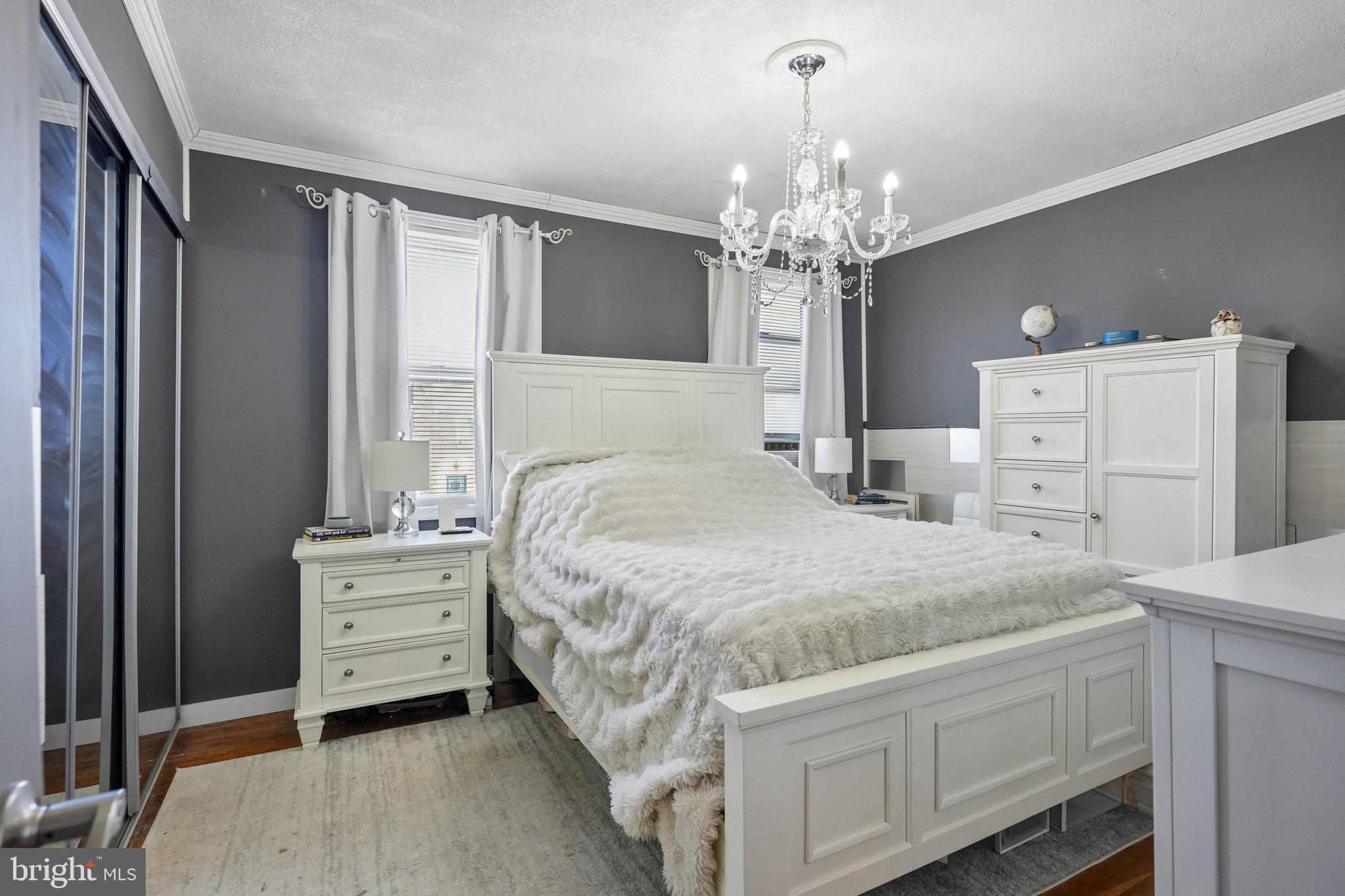7242 Algard Street Philadelphia, PA 19135 - Photo 15 of 25 Elegant bedroom with modern charm.