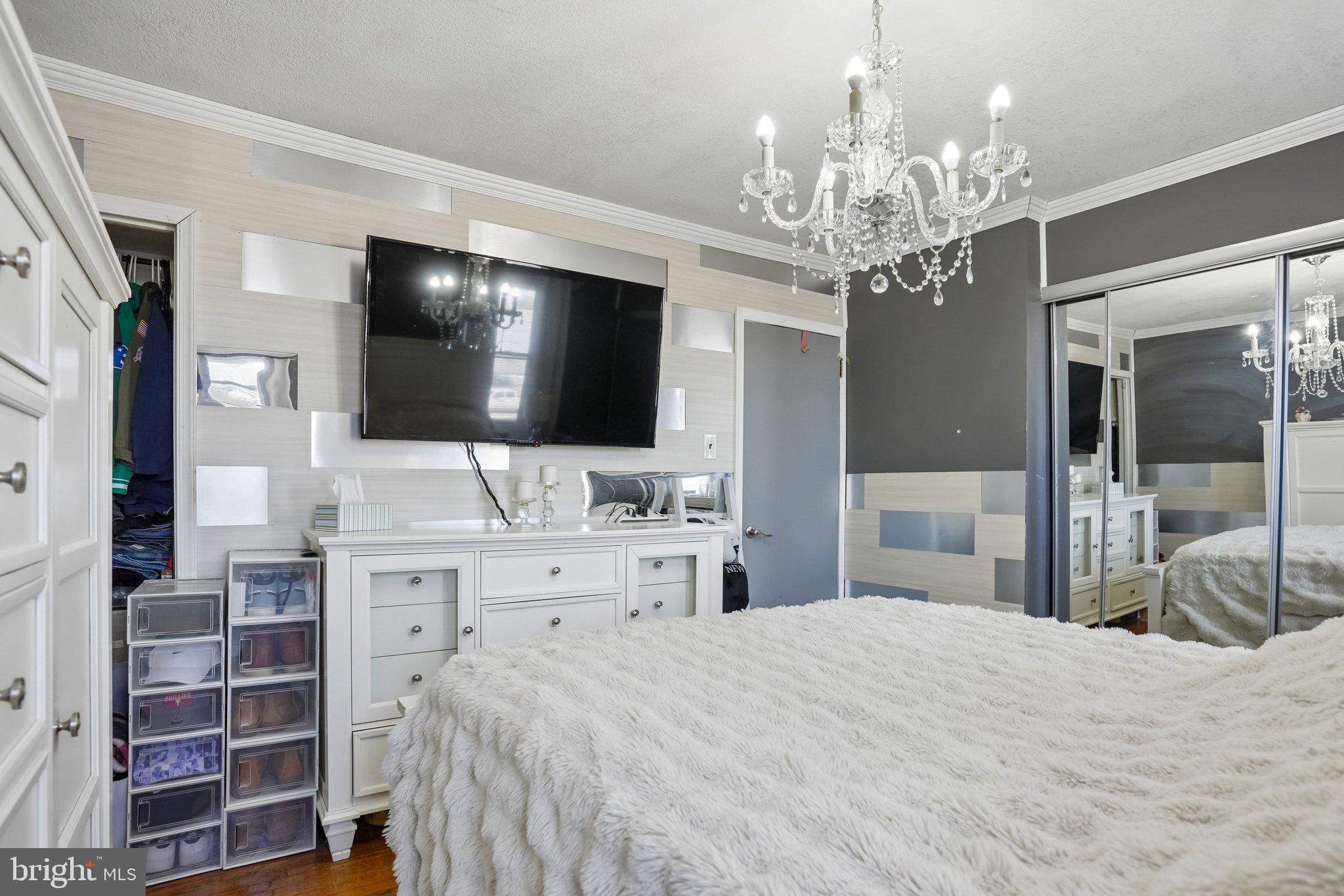 7242 Algard Street Philadelphia, PA 19135 - Photo 16 of 25 Chic bedroom with modern elegance.