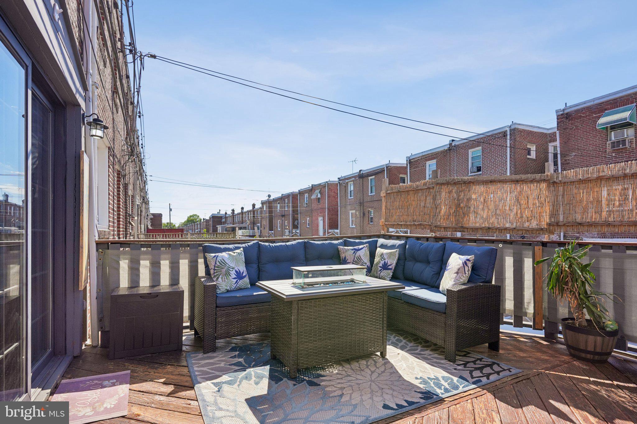 7242 Algard Street Philadelphia, PA 19135 - Photo 24 of 25 Charming outdoor retreat with skyline views.