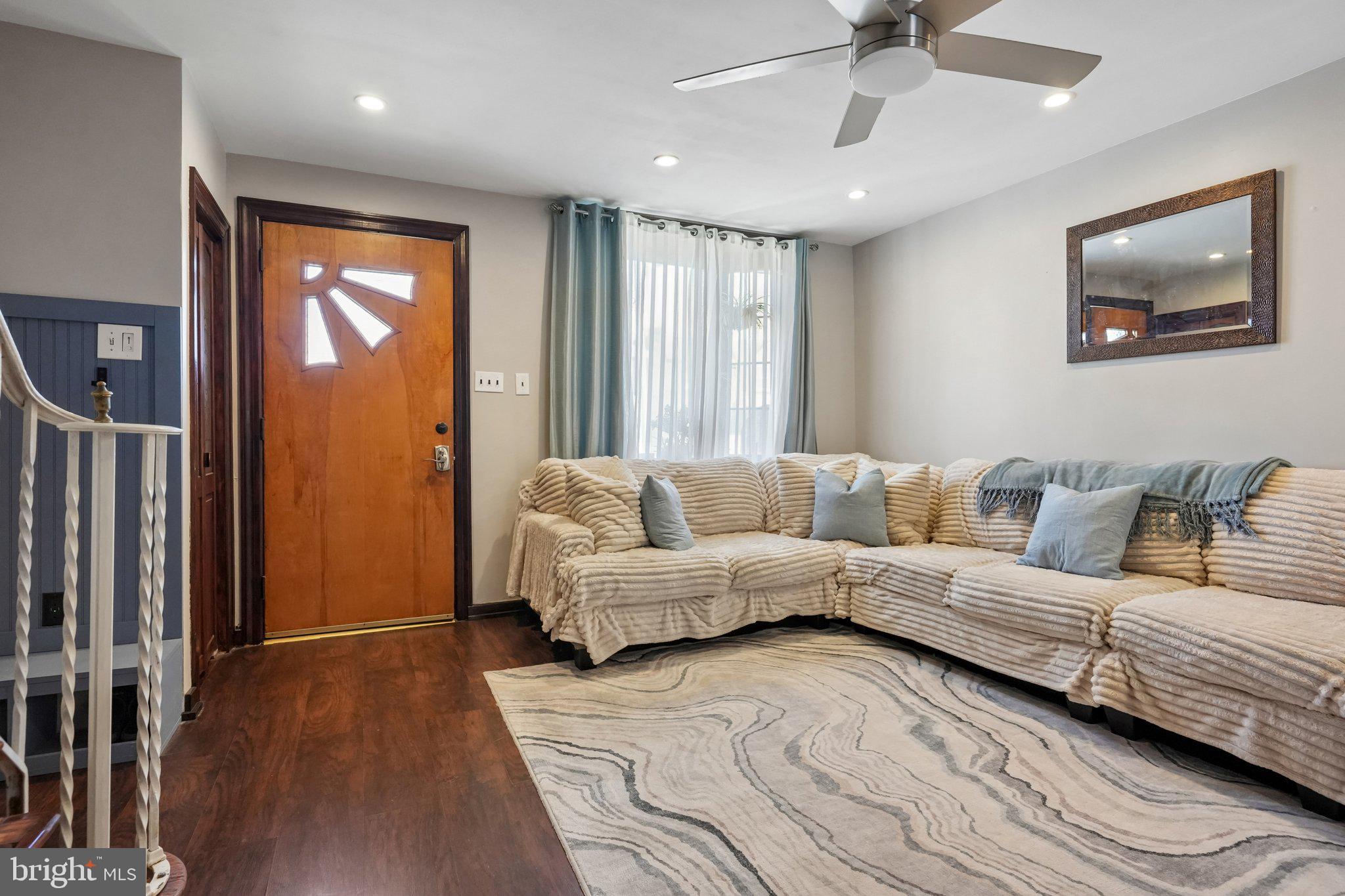 7242 Algard Street Philadelphia, PA 19135 - Photo 7 of 25 Inviting living space with natural light.