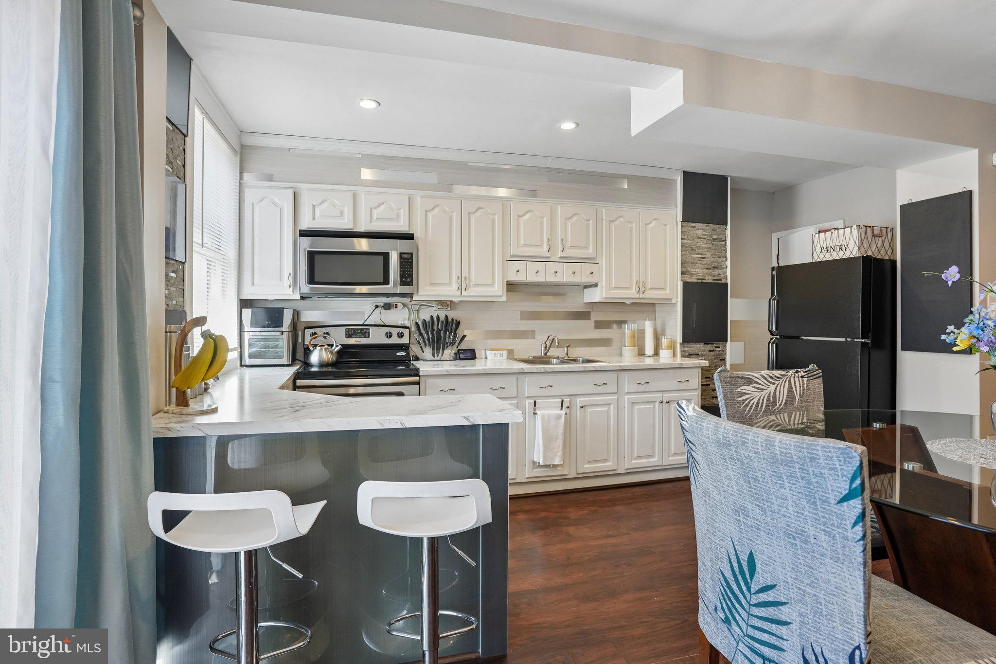 7242 Algard Street Philadelphia, PA 19135 - Photo 10 of 25 Modern kitchen with sleek finishes.