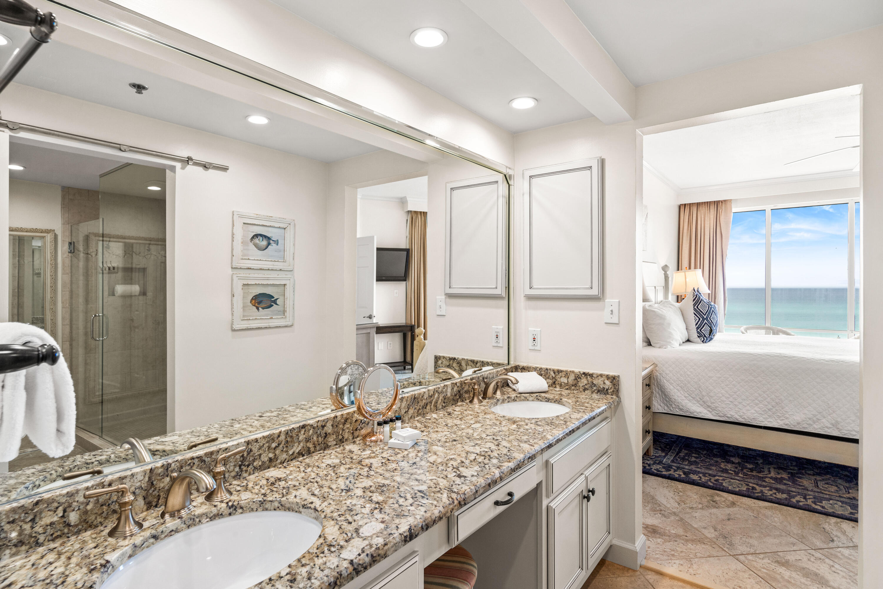 10254 East Co Highway, Unit 12W Inlet Beach, FL 32461 - Photo 15 of 42 a bathroom with a granite countertop sink and a mirror