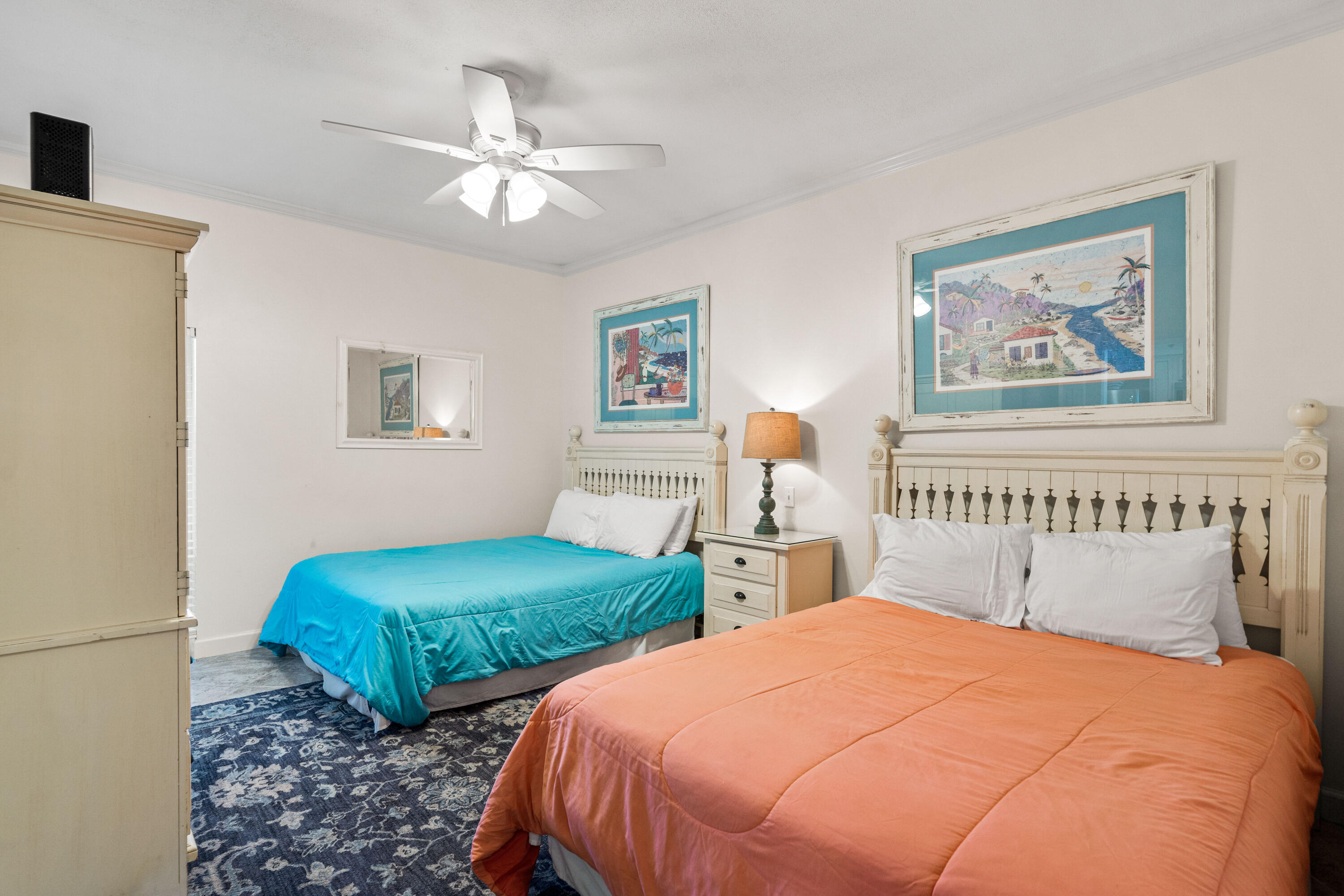 10254 East Co Highway, Unit 12W Inlet Beach, FL 32461 - Photo 18 of 42 a bedroom with two beds and a chandelier