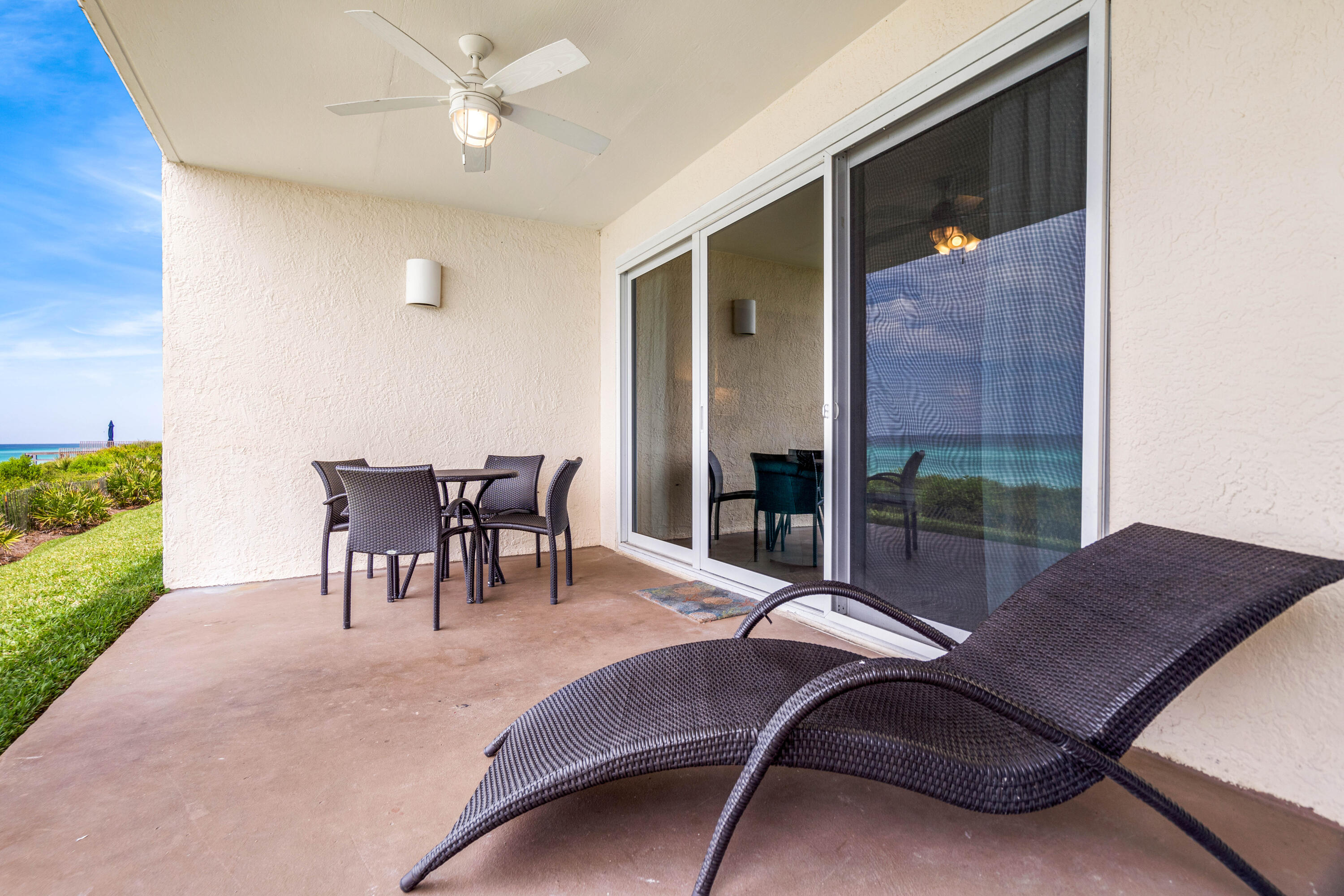 10254 East Co Highway, Unit 12W Inlet Beach, FL 32461 - Photo 22 of 42 a living room with furniture and a large window