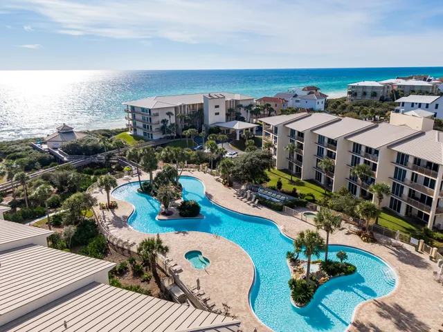 a view of a patio with a table chairs and a patio