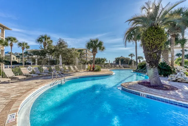 a view of a patio with swimming pool