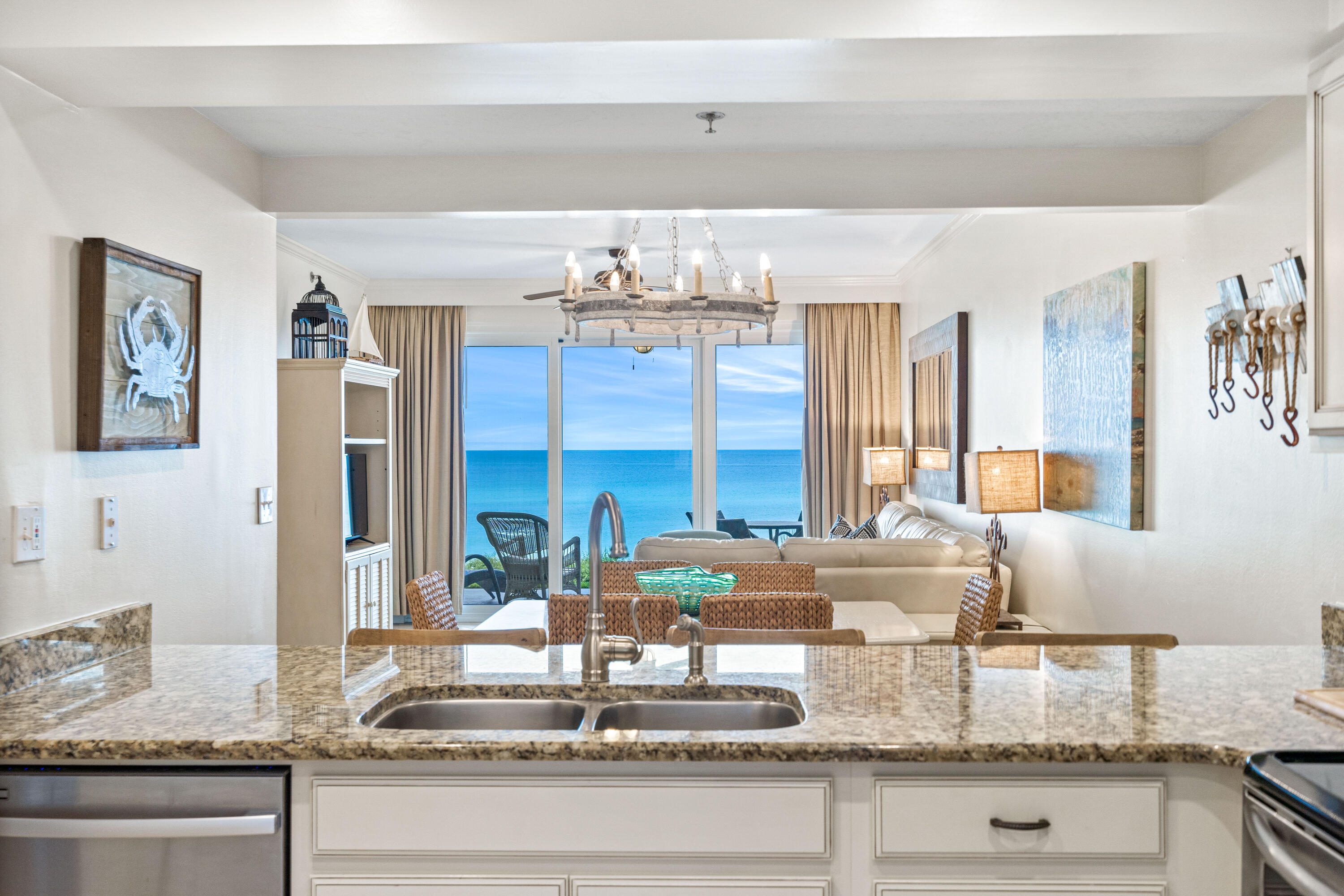 10254 East Co Highway, Unit 12W Inlet Beach, FL 32461 - Photo 4 of 42 a kitchen with granite countertop a stove and cabinets