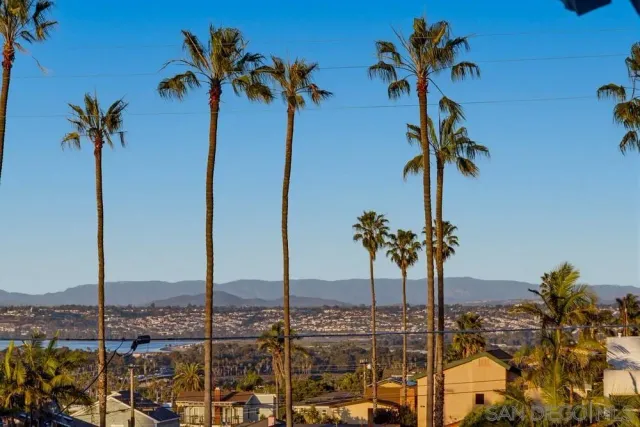 a view of a building with a yard