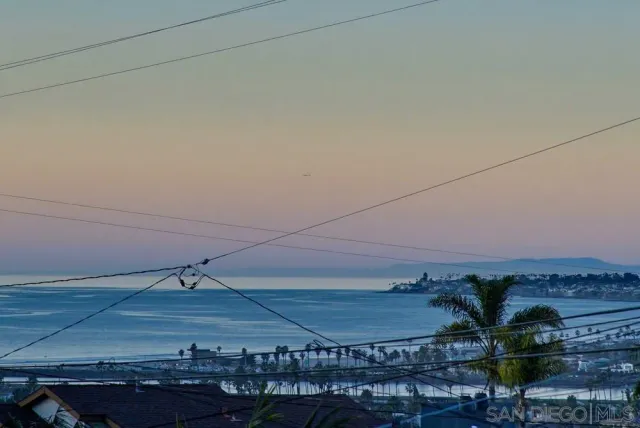 a view of an house with backyard porch and furniture