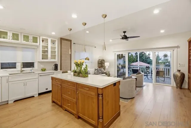 a living room with fireplace furniture and a flat screen tv