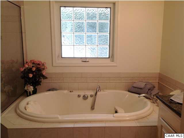 2803 Huntington Road Charlottesville, VA 22901 - Photo 32 of 42 a bathroom with a white tub