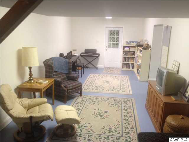 2803 Huntington Road Charlottesville, VA 22901 - Photo 42 of 42 a living room with furniture and a rug