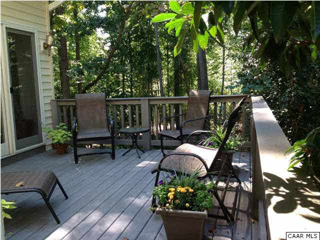 2803 Huntington Road Charlottesville, VA 22901 - Photo 8 of 42 a view of a patio with couches table and chairs and potted plants
