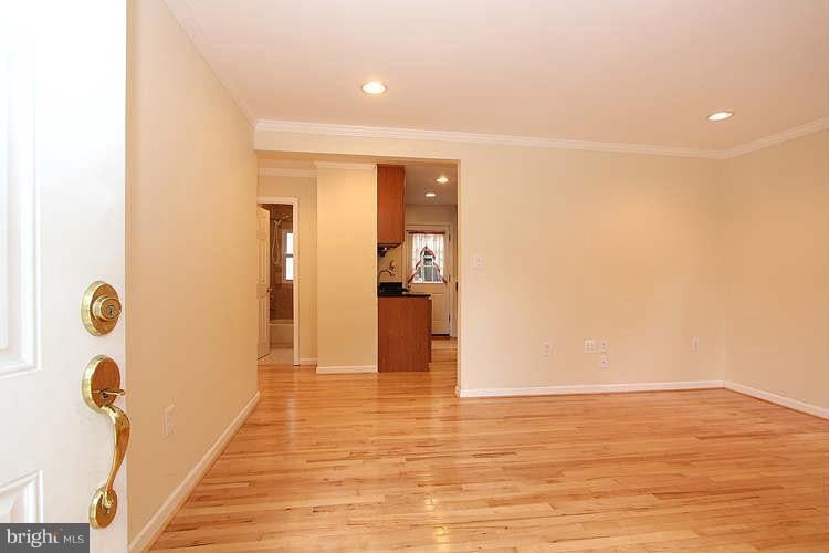 4403 Randolph Road Silver Spring, MD 20906 - Photo 4 of 28 a view of a hallway with wooden floor