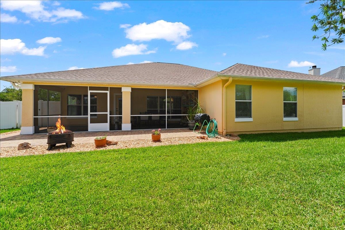 880 East Red House Branch Road St. Augustine, FL 32084 - Photo 37 of 65 a view of an house with backyard space and balcony
