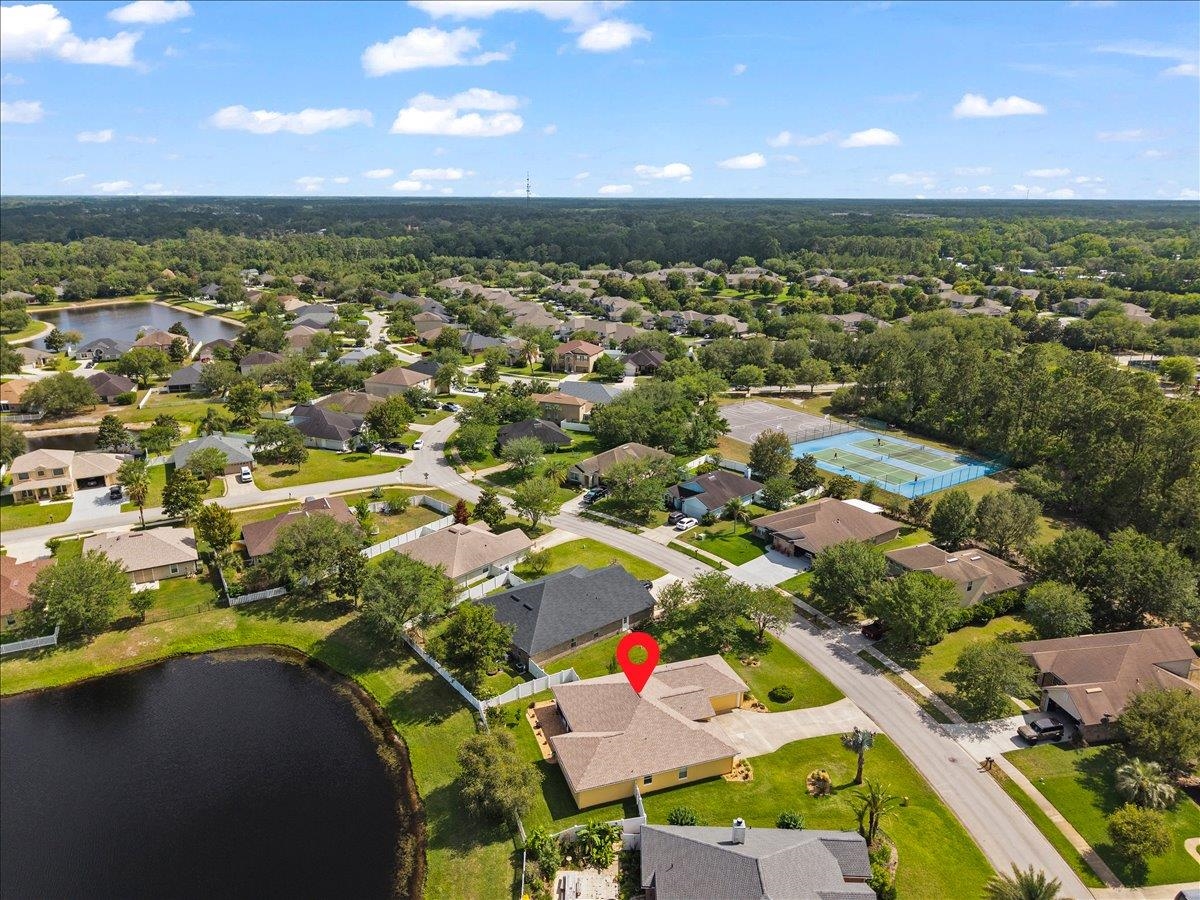880 East Red House Branch Road St. Augustine, FL 32084 - Photo 41 of 65 an aerial view of residential houses with outdoor space