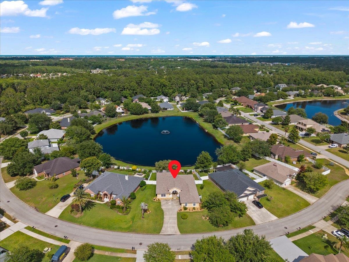 880 East Red House Branch Road St. Augustine, FL 32084 - Photo 42 of 65 an aerial view of residential houses with outdoor space