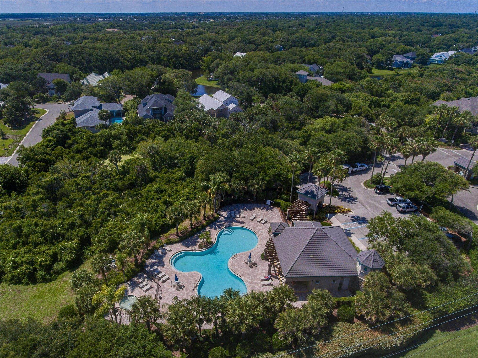 880 East Red House Branch Road St. Augustine, FL 32084 - Photo 50 of 65 an aerial view of a house with a garden