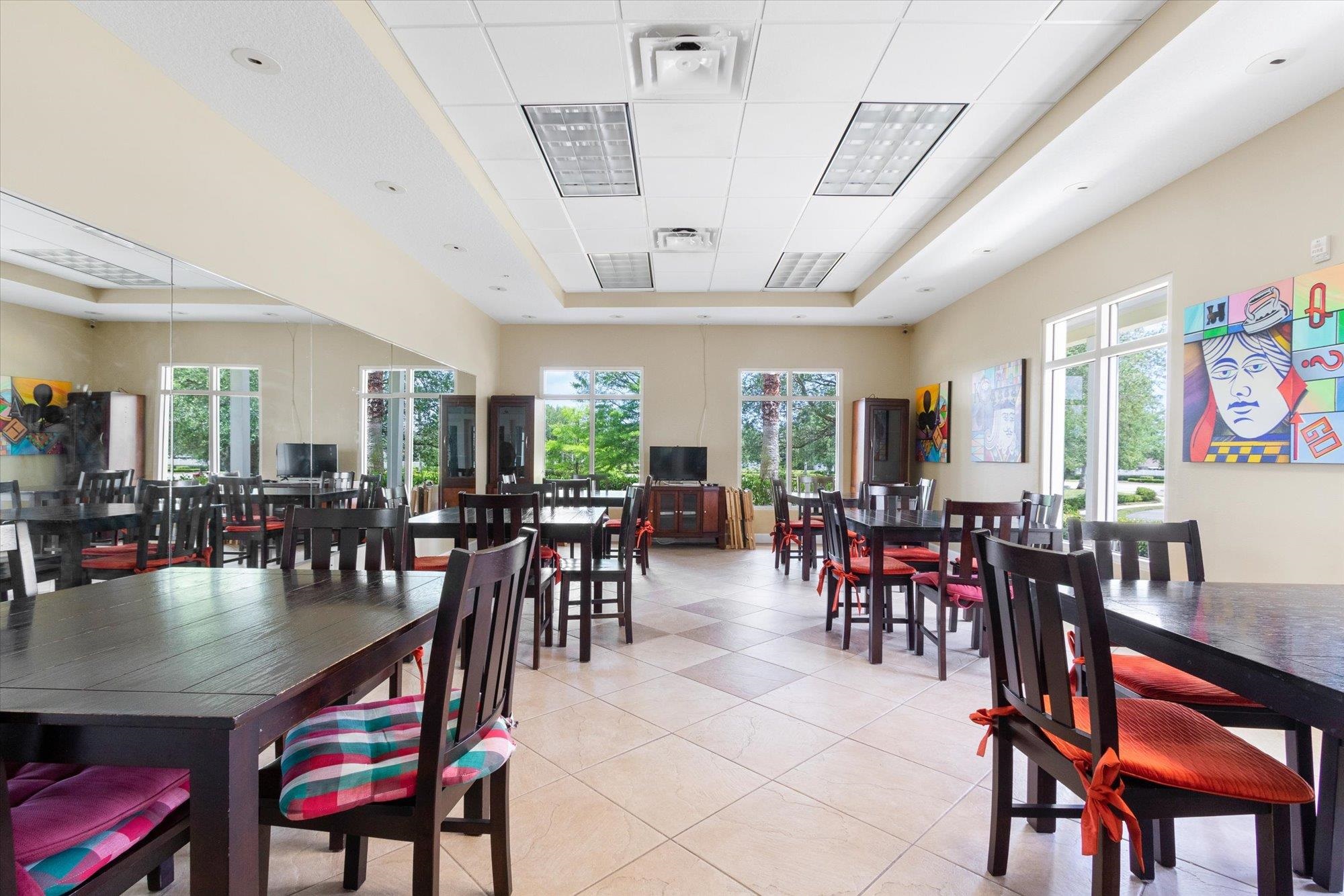 880 East Red House Branch Road St. Augustine, FL 32084 - Photo 56 of 65 a view of a dining room with furniture and chandelier