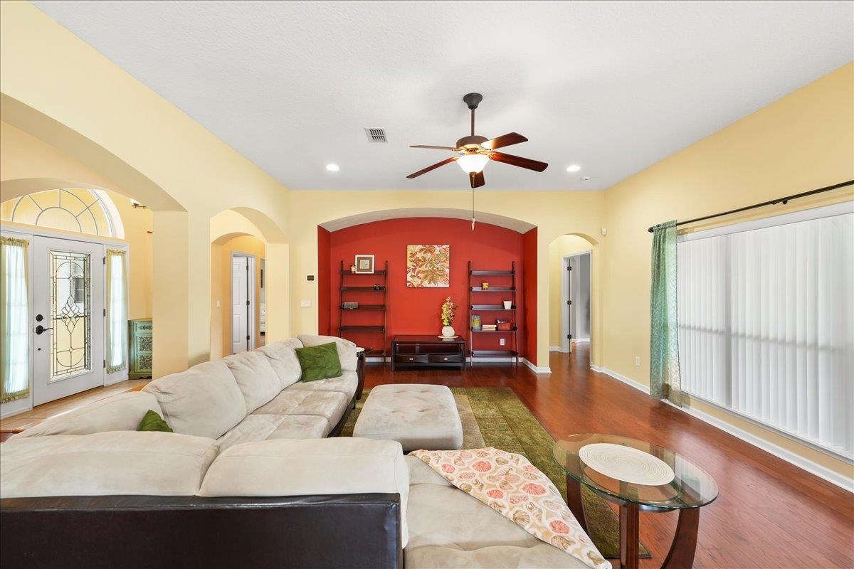 880 East Red House Branch Road St. Augustine, FL 32084 - Photo 9 of 65 a living room with furniture and a window