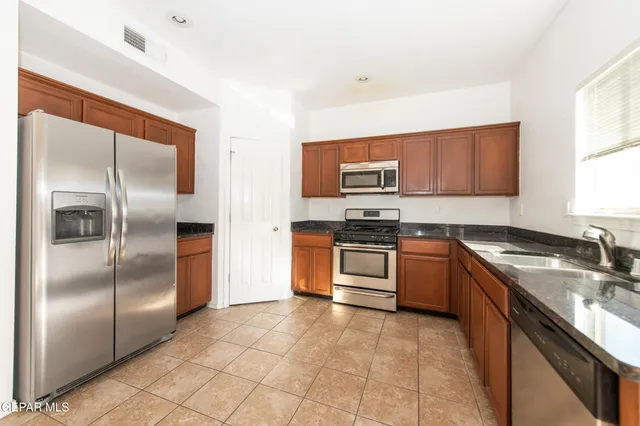 a front view of a house with a outdoor space