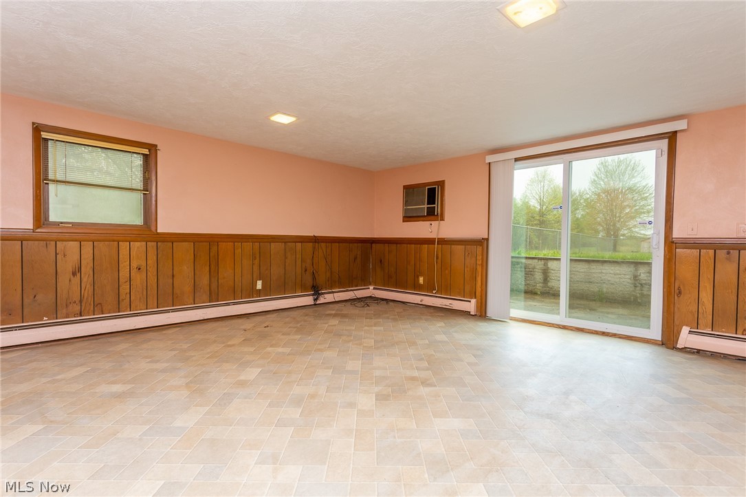 14313 Quarry Road Oberlin, OH 44074 - Photo 17 of 26 Family Room with Patio Doors to Backyard