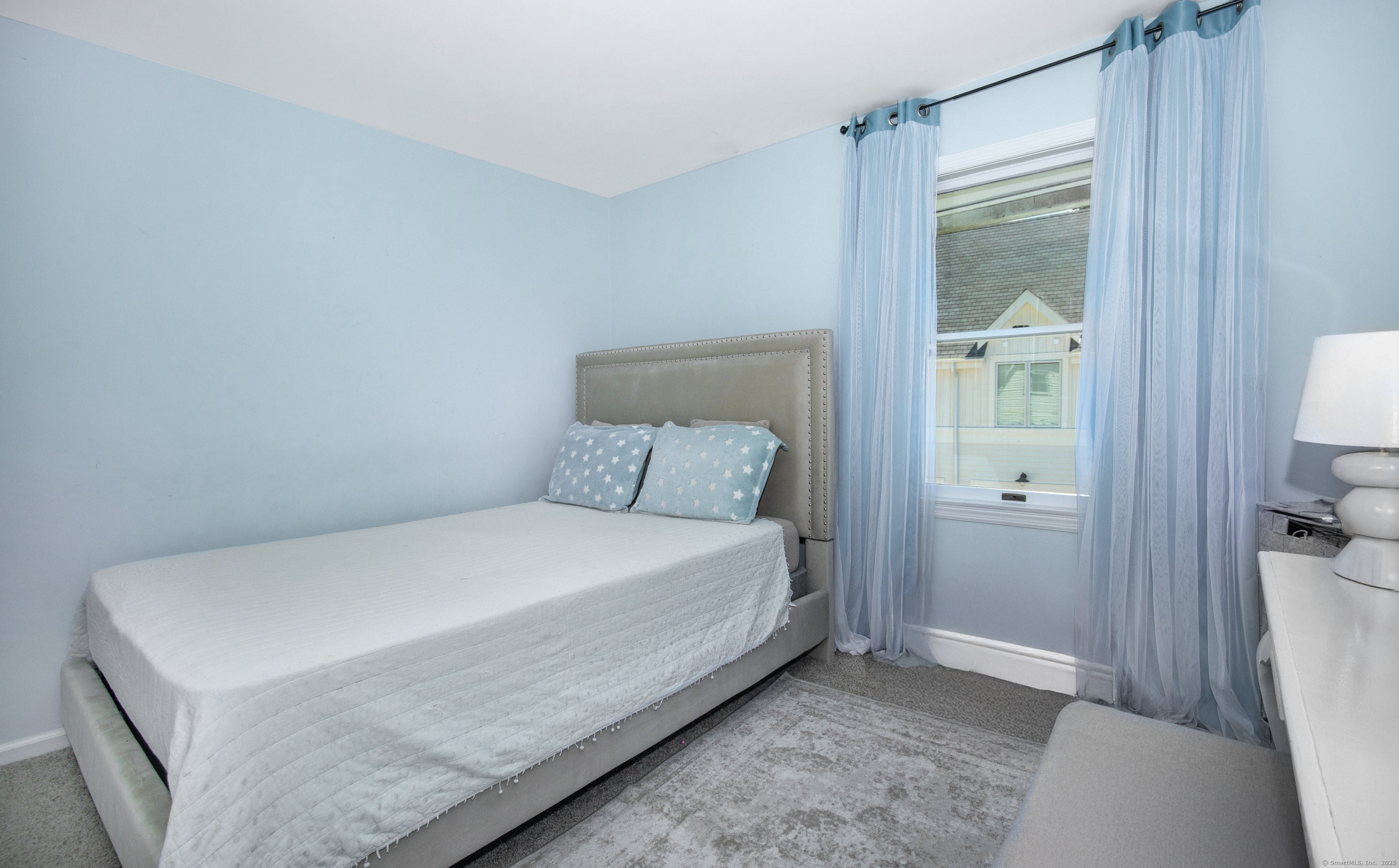 64 East Avenue New Canaan, CT 06840 - Photo 17 of 23 Second floor unit bedroom with large window