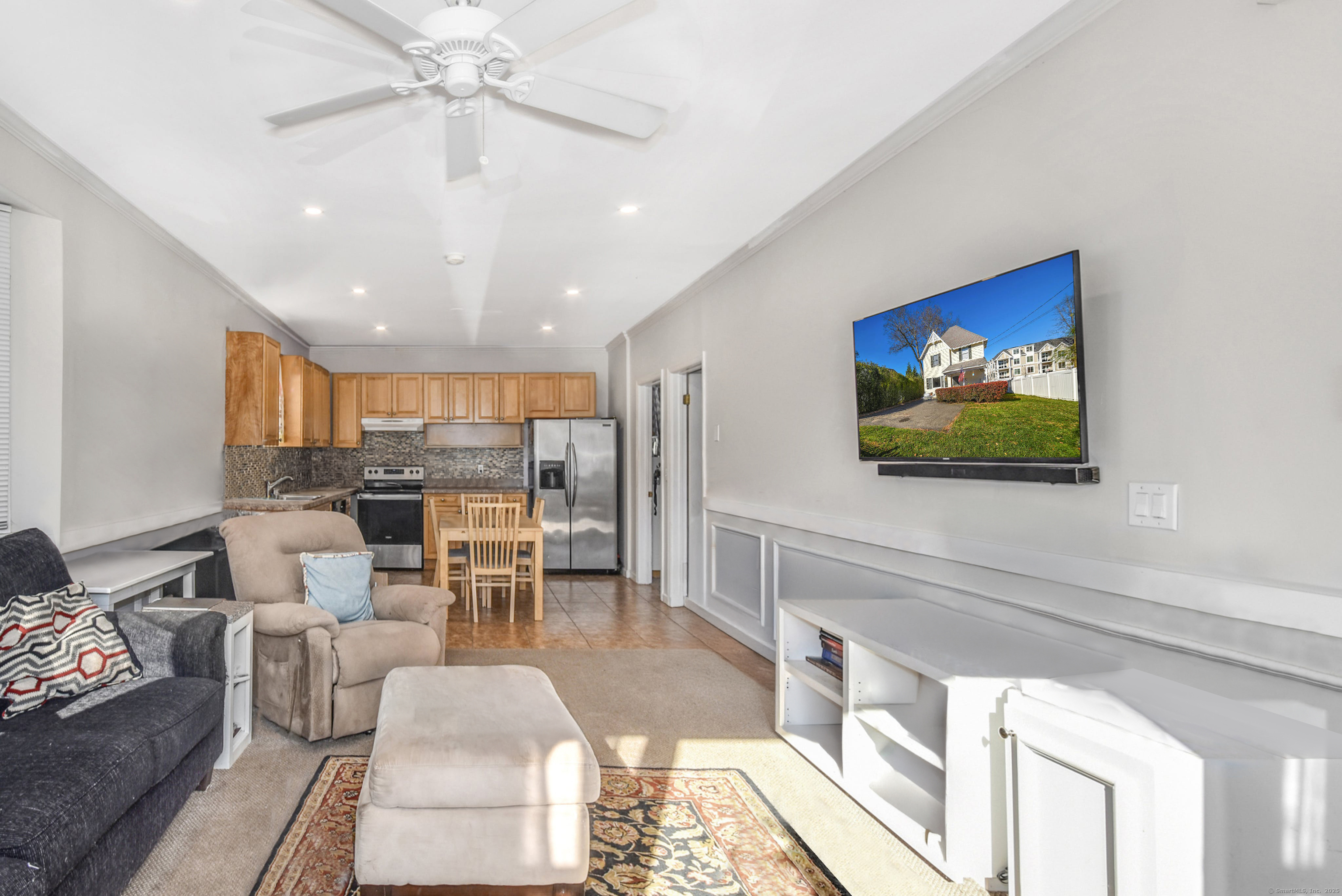64 East Avenue New Canaan, CT 06840 - Photo 4 of 23 First floor unit open livingroom kitchen