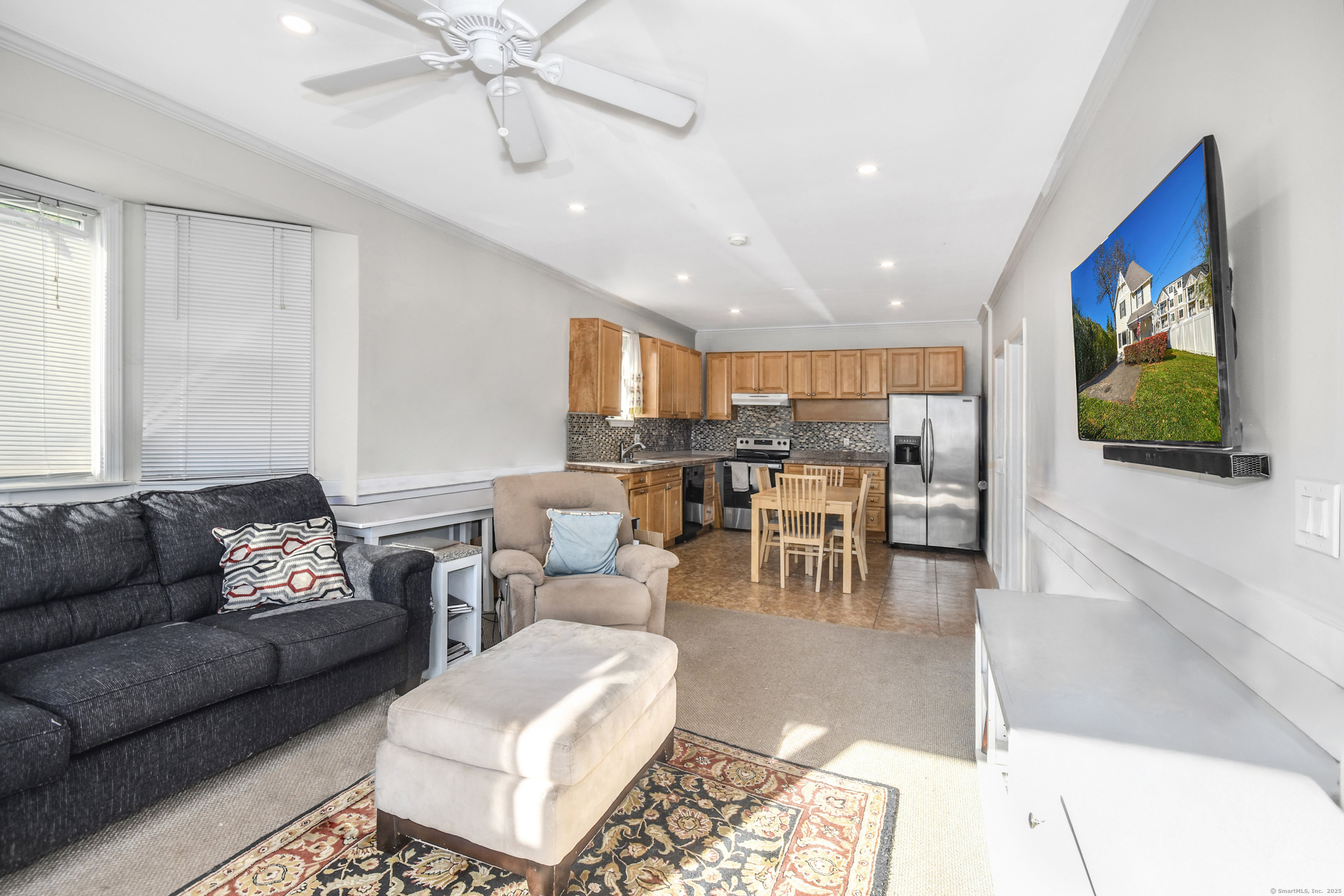 64 East Avenue New Canaan, CT 06840 - Photo 5 of 23 First floor unit open livingroom kitchen