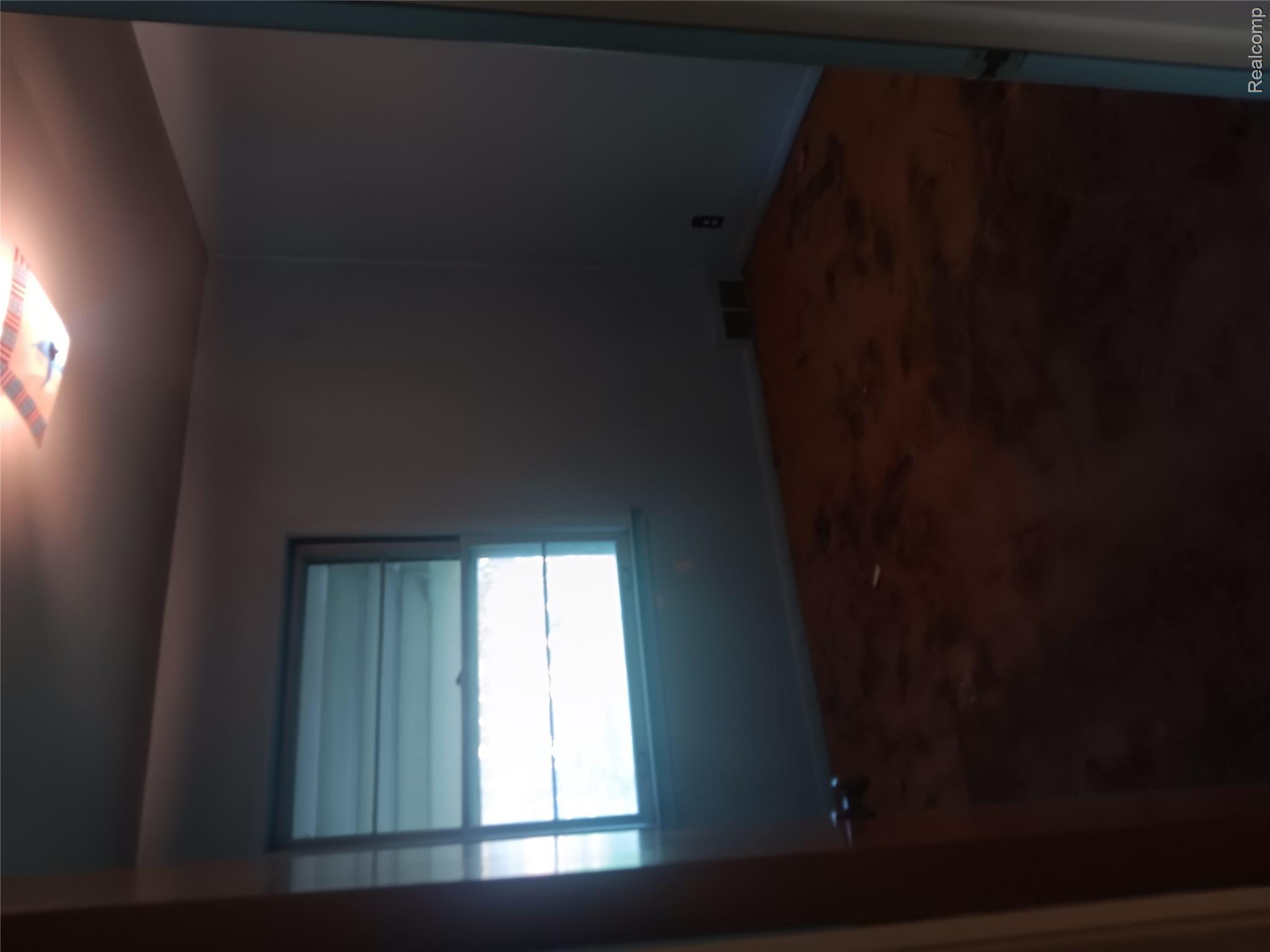 967 Washington Road Grosse Pointe, MI 48230 - Photo 13 of 15 Empty room with carpet and baseboards