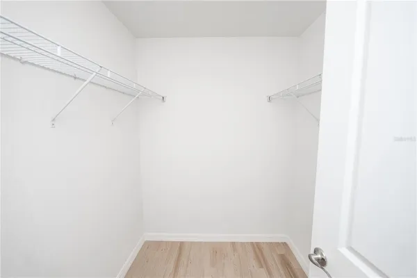 a view of small space with racks on the wall
