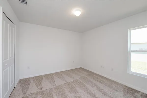 an empty room with a window