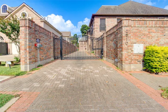 a view of entrance gate of a house