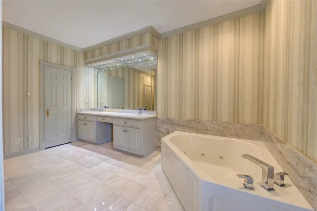 a bathroom with a sink a bathtub and a shower